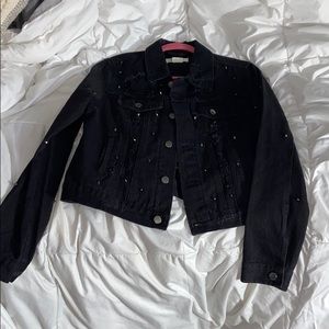 Distressed jean jacket